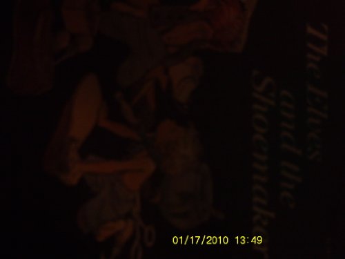 The Elves and the Shoemaker 0590074261 Book Cover