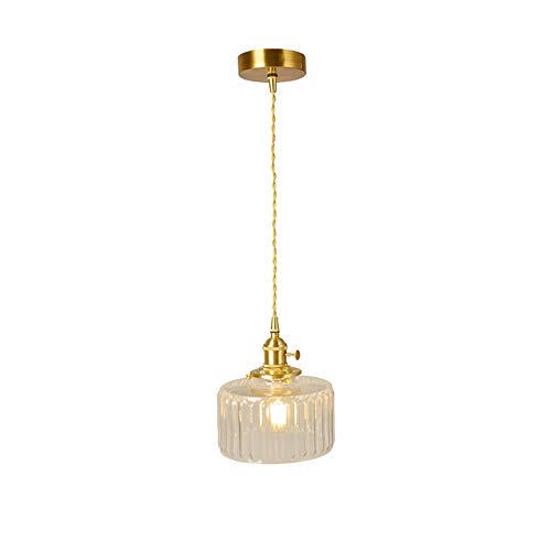 Lumière chaude et design : découvrez notre lustre de chevet suspendu