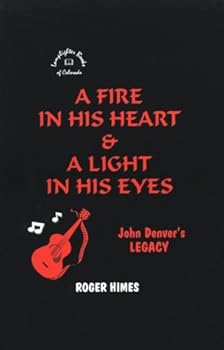 Paperback A Fire in His Heart & A Light in His Eyes: John Denver's Legacy Book