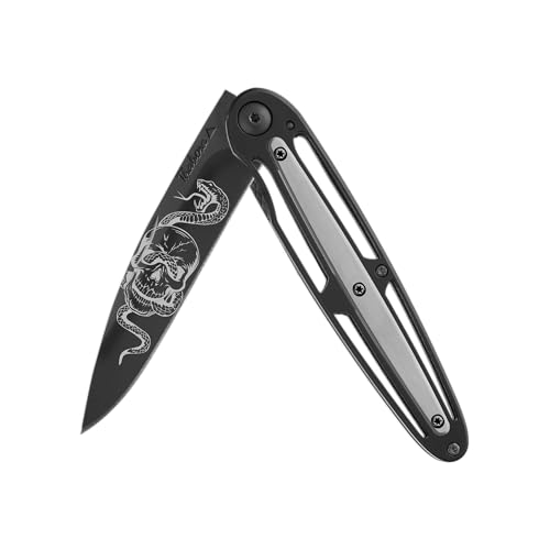 Thabora Couteau Acier Finition Titane Noir plaquette Centrale Acier brossé Motif «tête de Mort Serpent» Couteau Acier Finition Titane Noir plaquette Centrale Acier...