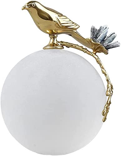 Boule de cristal moderne et oiseau en cuivre, l'harmonie poétique chez vous