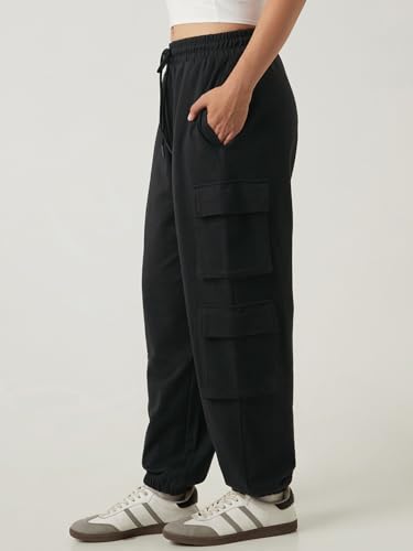 Image of Bewakoof Women's Cotton Super Loose Fit Joggers|Bewakoof Air 1.0 | Track pants for woman | Lower for women | Multipurpose | Activewear | Utility Pockets | Lightweight & Flexible Elastic Waist | Casual Joggers | Loose Fit