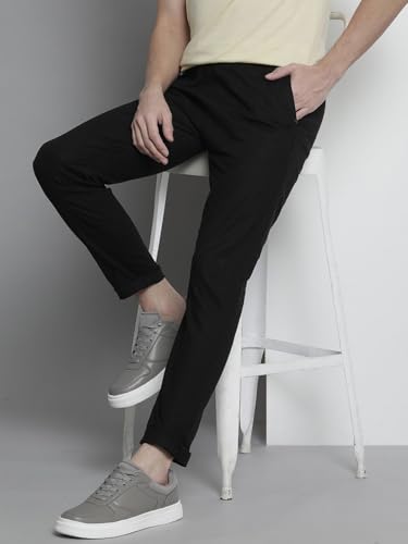 Image of The Indian Garage Co Men Slim Fit Solid Mid-Rise Elasticated Linen Jogger Trouser
