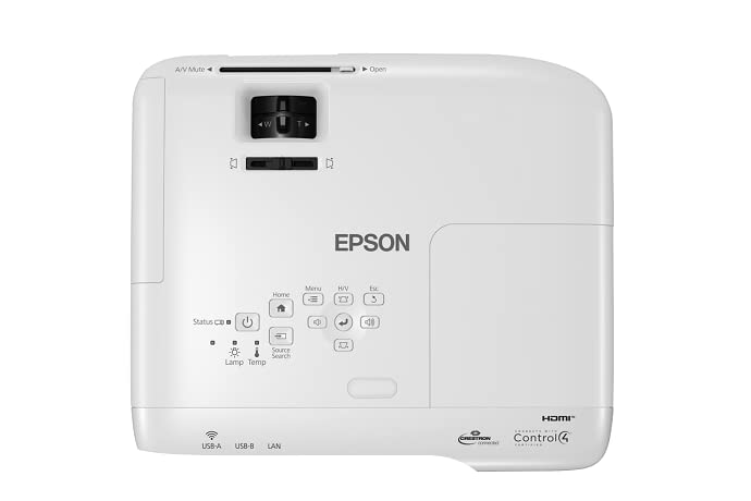 Top view of the Epson EB-972 projector, showing the control panel buttons and focus/zoom rings.