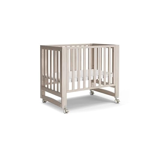 MAMAZING EvoNest Baby Crib, 3 in 1 Convertible Mini Crib with Wheels, 100% New Zealand Wood Crib, 4 Adjustable Mattress Height, GREENGUARD Gold Certified, Washed Natural