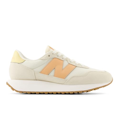 New Balance Women's 237 V1 Sneaker, Angora/Hazy Peach/Washed Amber, 11