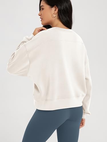 Image of ODODOS Modal Soft Long Sleeve Cropped Sweatshirts for Women Oversized Crew Neck Pullover Crop Top
