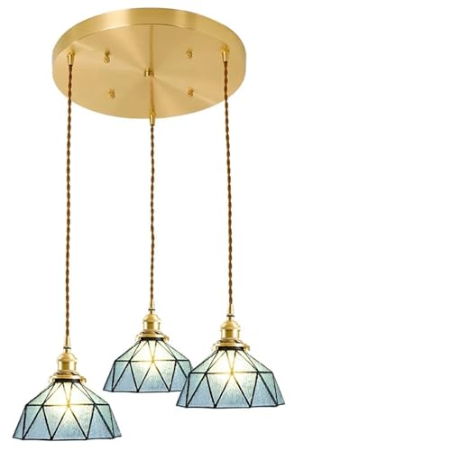 Lustre nordique style vintage pour illuminer une table de restaurant ou un bar chic