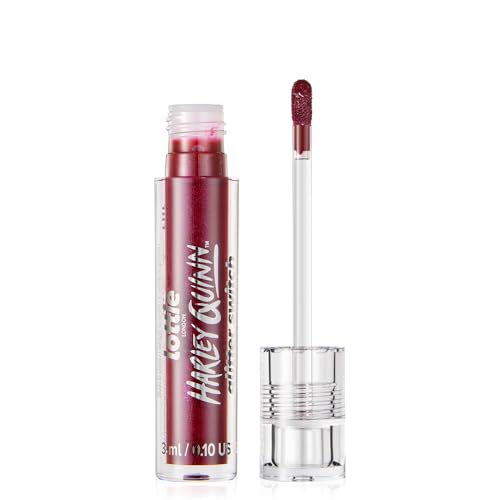 Lottie London x Harley Quinn Transforming Liquid Lipstick in Killin It Transforming liquid lipstick with a metallic glitter finish in a deep berry shade
