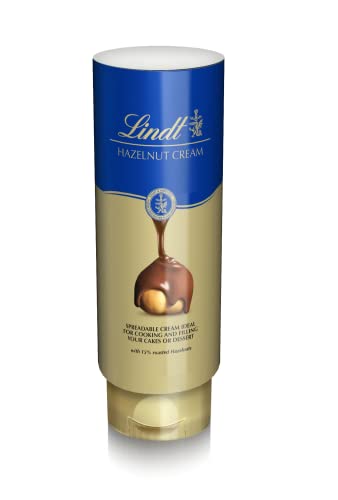 Lindt Crema de cacao y avellanas, chocolate fluido, ideal repostería, postres, coberturas, fondues, rellenos, toppings y untar, sin gluten, sin aceite de palma, bote bocabajo antigoteo 650g
