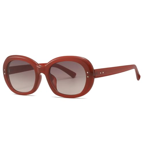 Lunettes de soleil ovales punk aux finitions rivets et verres haut de gamme