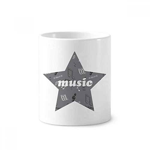 Rangement bureau musique tasse blanche céramique contre le désordre