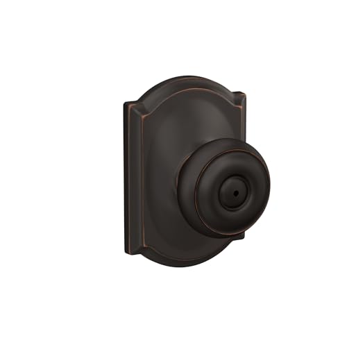 Image of Schlage F40 GEO 716 CAM Georgian Door Knob with Camelot Trim, Bed & Bath Privacy Lock, Aged Bronze
