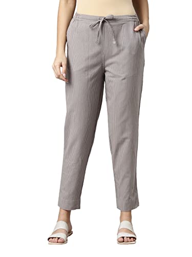 Image of GO COLORS Ikat Print Beige Printed Pencil Pant for Women | Breathable, Side Pocket