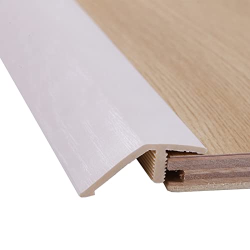 Seuil de porte en PVC pour compenser le dénivelé carrelage bois