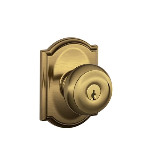 Image of SCHLAGE F51A GEO 609 CAM Georgian Knob with Camelot Trim Keyed Entry Lock, Antique Brass