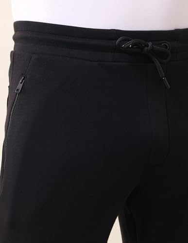 Image of U.S. Polo Assn. Men's Black Solid Mid Rise Cotton Drawstring Slim Fit Flat Front Slit Pocket Track Pants