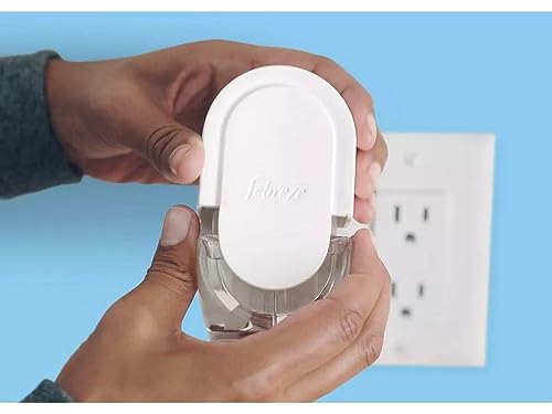 Febreze Plug with Fade Defy Technology Air Freshener (2) of 0.87 fl oz Refills (White Pine & Juniper Berry)