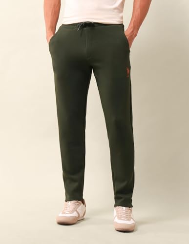 Image of U.S. Polo Assn. Men's Green Solid Mid Rise Cotton Drawstring Slim Fit Flat Front Slit Pocket Track Pants