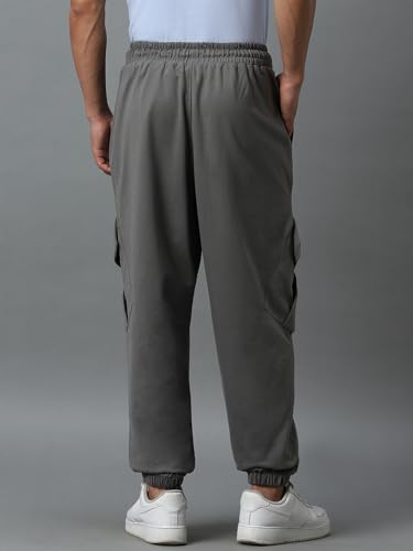 Image of Bewakoof Men's Cotton Super Loose Fit Joggers|Bewakoof Air 1.0 | Track pants for man | Lower for man | Trouser for men | Baggy trackpants for men | Multipurpose | Mens Lower Activewear | Utility Pockets | Lightweight & Flexible Elastic Waist | Casual Joggers | Loose Fit