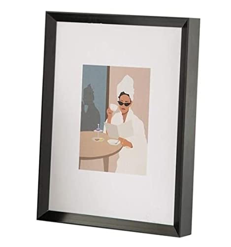 Decoración de marcos fotográficos de aluminio negro para crear una galería de arte en tu salón 2