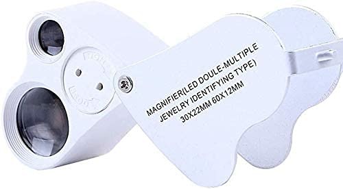 Lupa con lámpara para verificar la autenticidad de joyería antigua
