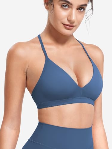 Image of YEOREO CoreFlex Sports Bras for Women Strappy Padded Halter Open Back Light Impact Deep V Neck Yoga Workout Gym Tops