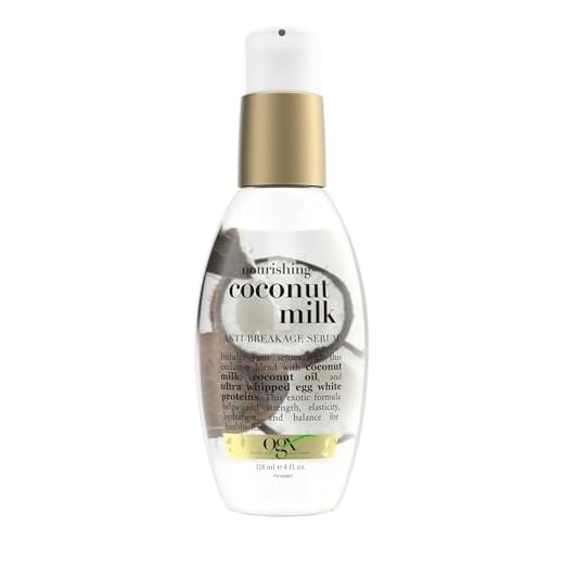 OGX 91008 Anti-Bruch-Serum Nährende Kokosmilch, Paraben und Sulfatfrei, nachhaltige Inhaltsstoffe, Verstärkung, Schutz, Feuchtigkeitsspendende, 4 Unzenpumpenflasche
