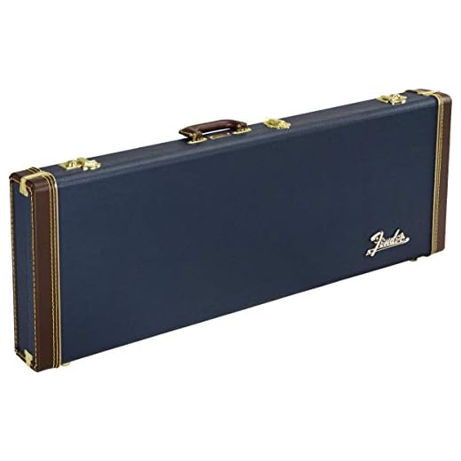 Fender Classic Series Wood Case, Stratocaster/Telecaster, Navy Blue | Fits Stratocaster & Telecaster, hardshell wood construction, navy blue exterior, plush interior lining, secure latches