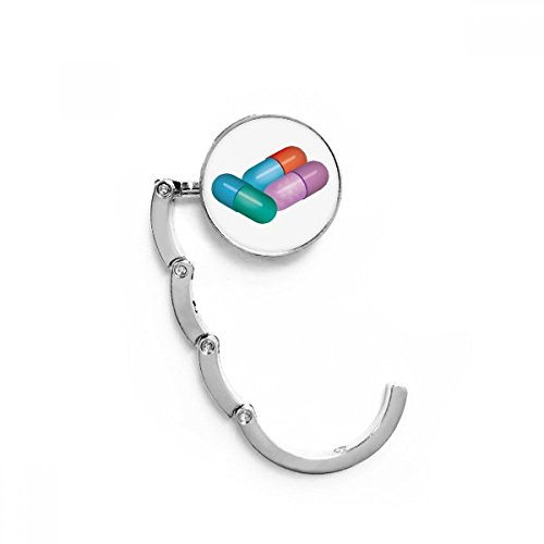 Accroche-sac pliable contre les sols sales support de table compact motif gélule multicolore
