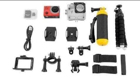 All components of the Explore One 4K WiFi Action Camera package laid out on a white background.