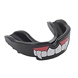 Ponte los dientes superiores después de suavizarlos y ajústalos para que quepan en tus dientes.