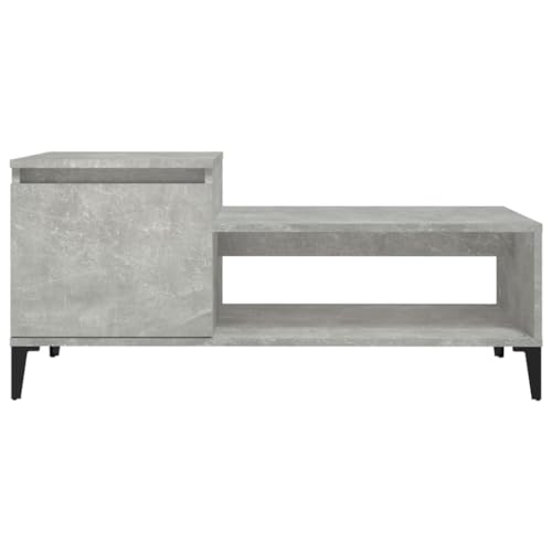 Table basse gris béton pour aménager un coin canapé chaleureux