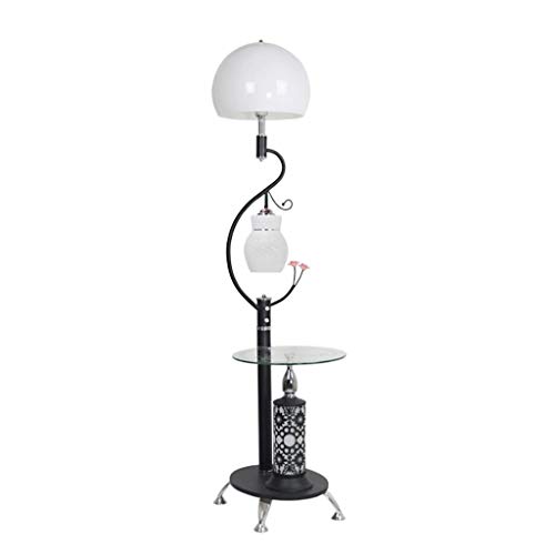 Lampadaire avec table basse en verre pour optimiser les petits salons