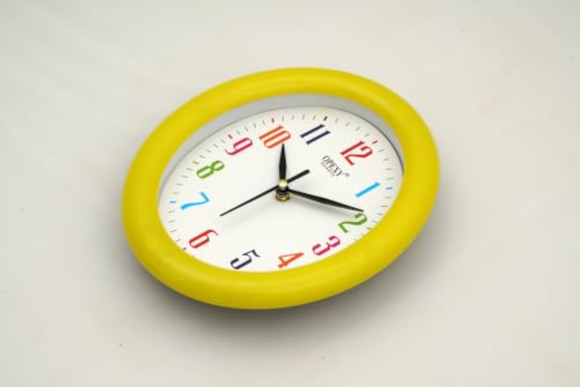 Quartz Oval Analog Wall Clock with Multicolour Dial