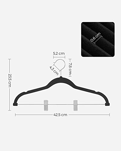 Image of SONGMICS Trouser Hangers, Set of 12 Velvet Hangers with Adjustable Clips, 42.5 cm Long, Non-Slip, Space-Saving, for Skirts, Coats, Dresses, Black CRF12B | Space Saving Hangers for Skirts and Trousers, Non-Slip, Adjustable Clips, Ink Black, BREANNA Collection CRF12B