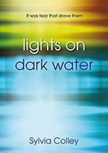 Paperback Lights on Dark Water Book