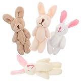 Artisanat détaillé : la poupée lapin présente des yeux et un nez finement travaillés, mettant en valeur l'attention portée aux détails, pâques, pendentif porte-clés animal en peluche