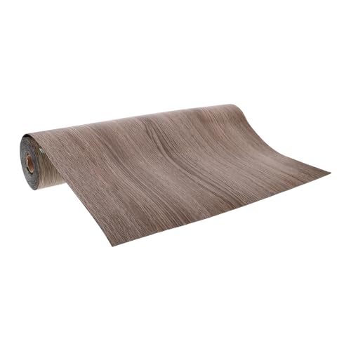 Papier peint adhésif bois pour rénover un sol usé sans gros travaux