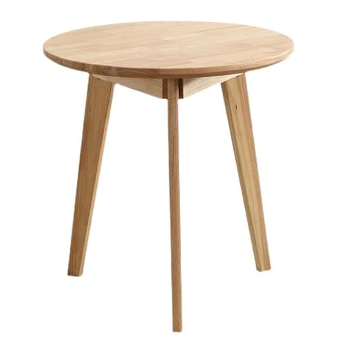 Table à manger ronde en bois pour rompre le manque de place en salle