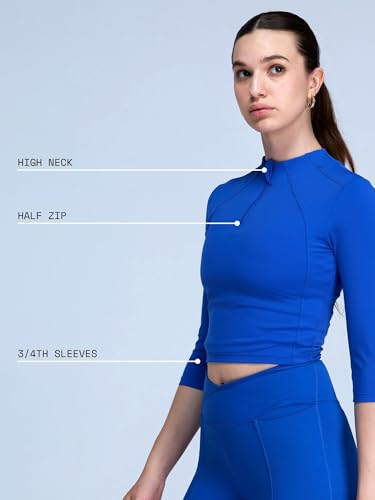 Image of CAVA Women's Silhouette Zip Top | Cropped Half-Zip Activewear with Flattering Seamlines, High Neck & 3 /4 Sleeves | ADPT Stretch Fabric for Gym, Yoga & Everyday Wear