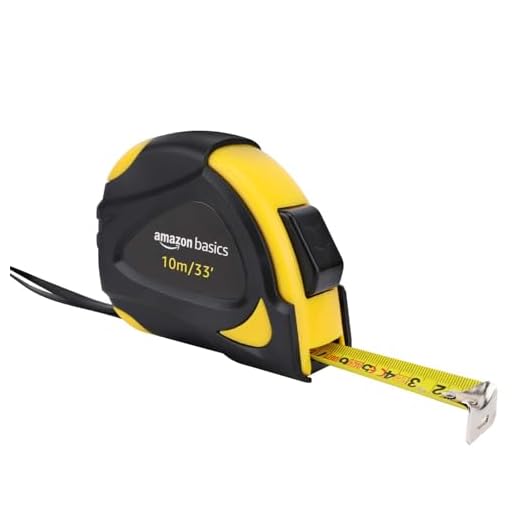 Amazon Basics Cinta métrica con cierre automático, escala y en pulgadas, precisión MID, 10 m (Paquete de 1), Negro, Amarillo