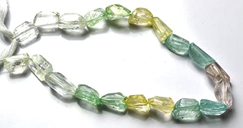Aigue-marine multicolore en nuggets facettés 11-14mm contre les bijoux ternes