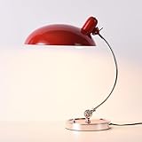 Matériaux de haute qualité et construction élégante : Fabriquée en aluminium robuste avec une finition dorée, cette lampe de table allie durabilité et sophistication. Son abat-jour, disponible en noir ou blanc, apporte un contraste raffiné et intemporel.