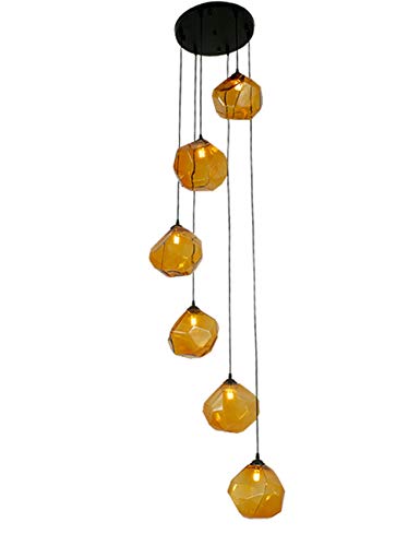 Lustre à boules de verre rotatif pour optimiser l'éclairage d'un escalier