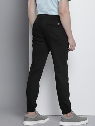 Image of The Indian Garage Co Men Slim Fit Solid Mid-Rise Stretchable Chino Joggers