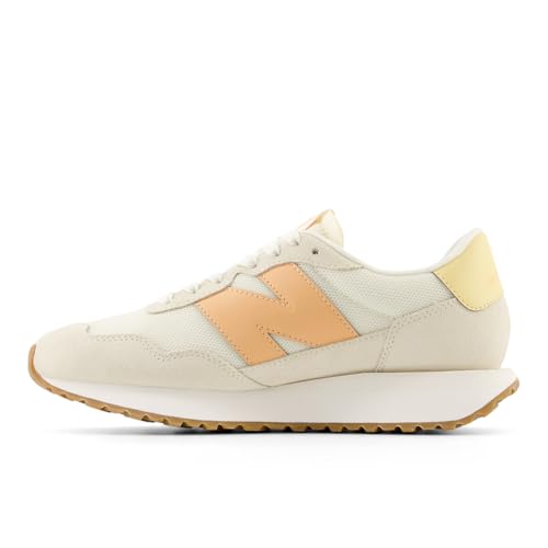 New Balance Women's 237 V1 Sneaker, Angora/Hazy Peach/Washed Amber, 11