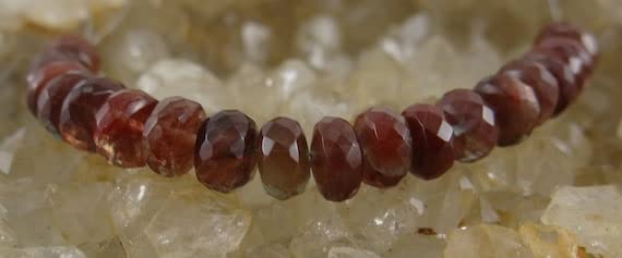 Perles Andesine facettées sans défaut pour éviter la casse lors du montage de bijoux