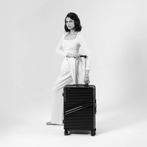 Image of Assembly 24-Inch Trolley Bag Medium Size with 8 Wheels & TSA Lock, Polycarbonate Hard Shell Check in Luggage Trolley for Weekend & Business Travel Trips, Black