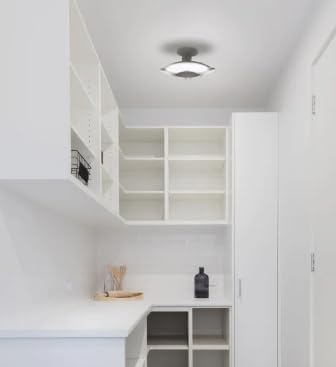The Enbrighten LED Utility Light installed in a pantry, providing bright, even lighting.